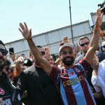 Mohamed Salah greeted by hundreds of ecstatic supporters on his arrival in Istanbul