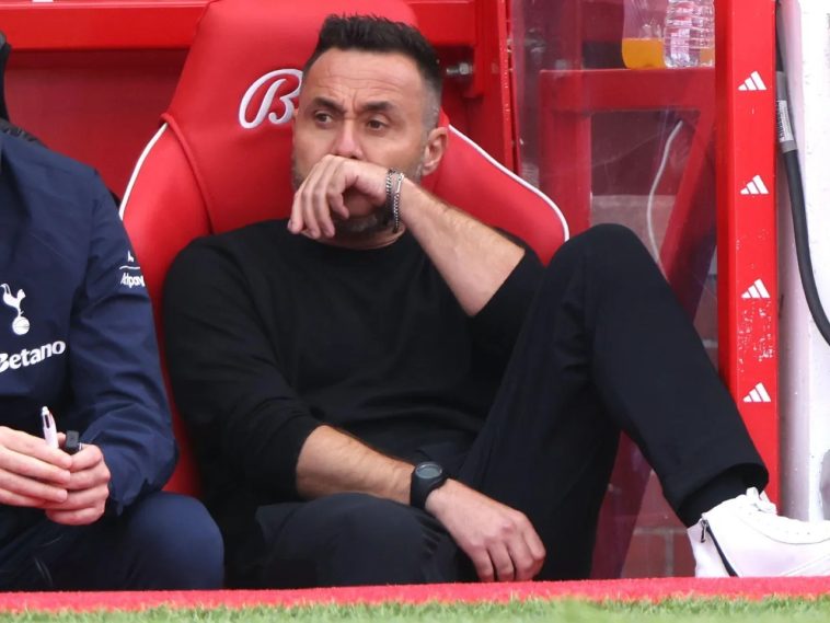 Tottenham players dejected after another defeat