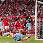 Erling Haaland celebrates scoring Manchester City's controversial winner at Old Trafford