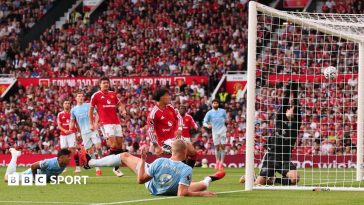 Erling Haaland celebrates scoring Manchester City's controversial winner at Old Trafford