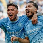 Rayan Cherki and Enzo Fernandez celebrate during Manchester City's 5-3 win over Sunderland
