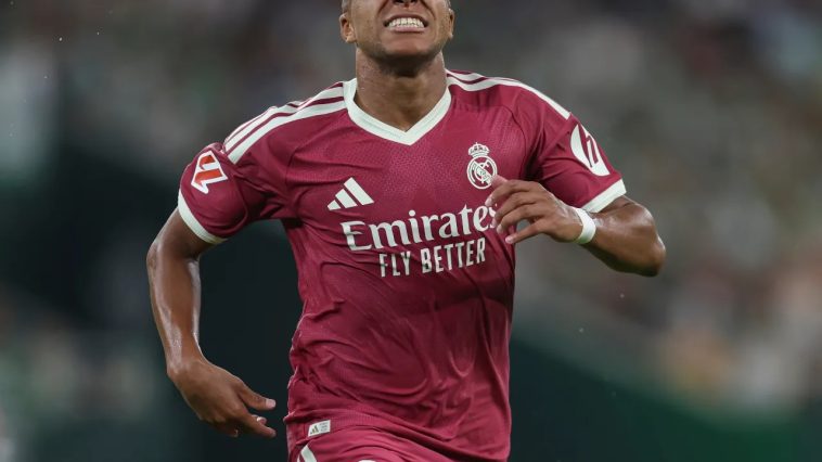 Kylian Mbappe reacts during Real Madrid's defeat at the Bernabeu