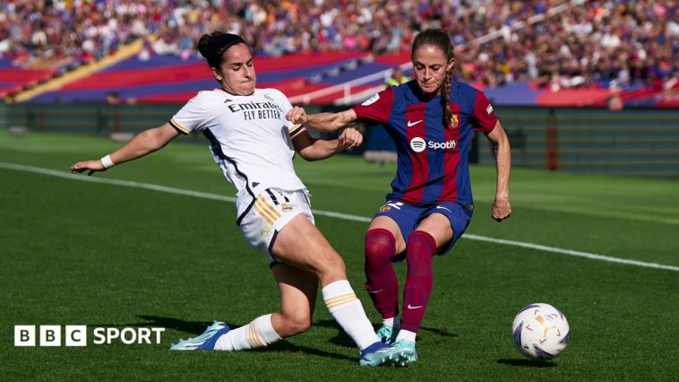 Players from Real Madrid and Barcelona contest a Liga F fixture, the Spanish league where footballers struck over pay and conditions in 2023