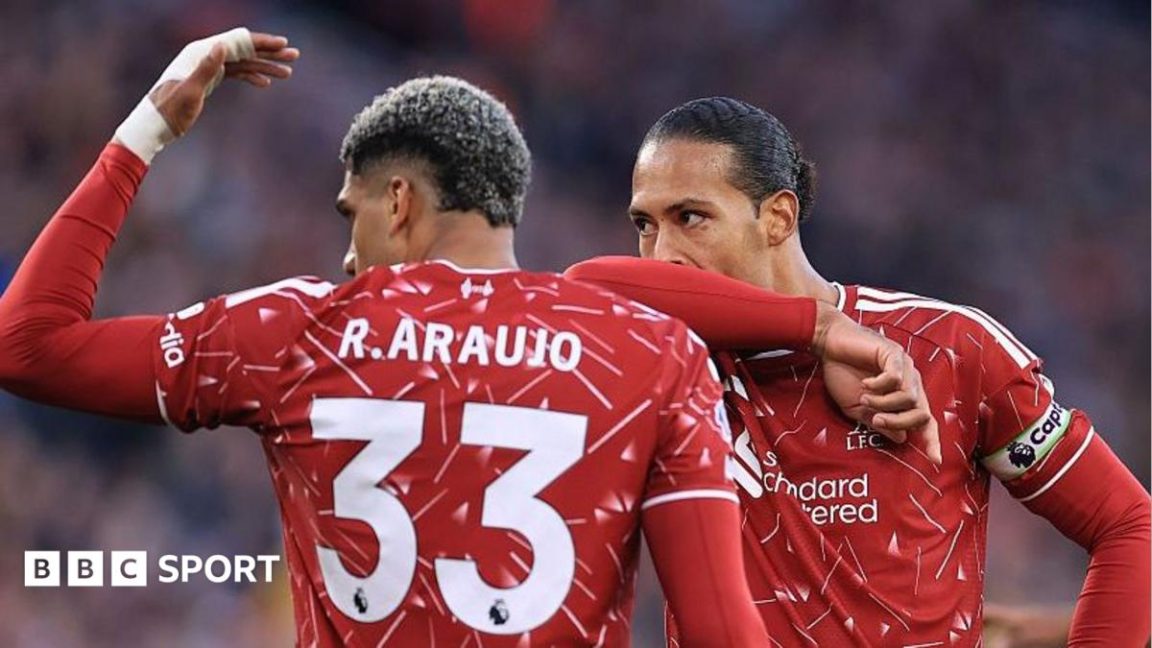Liverpool players look dejected at Anfield during their 3-0 Premier League home defeat by Manchester City